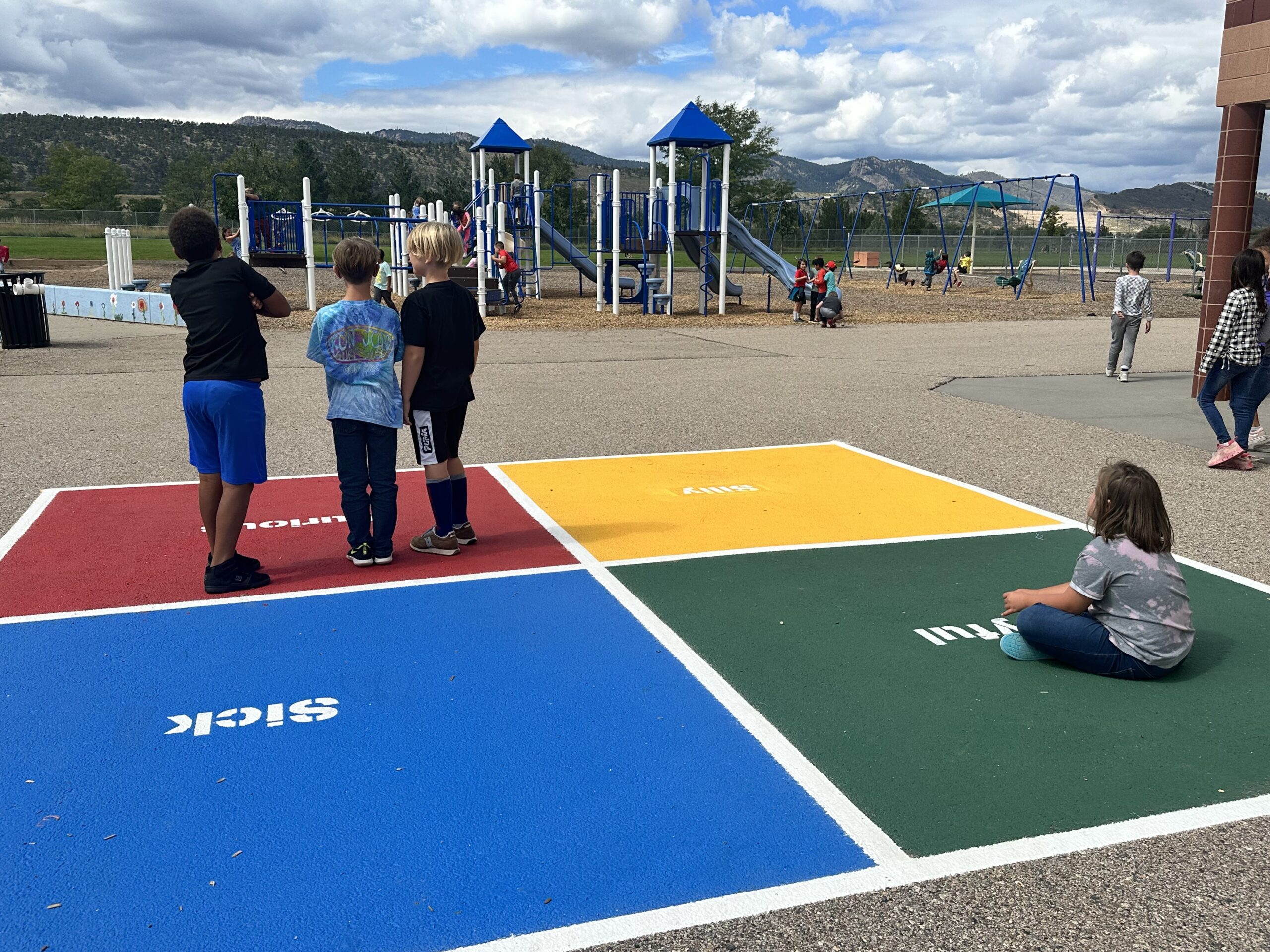 Olander Elementary School Students learn and play on the social emotional blacktop funded in 2023 by an Impact Grant